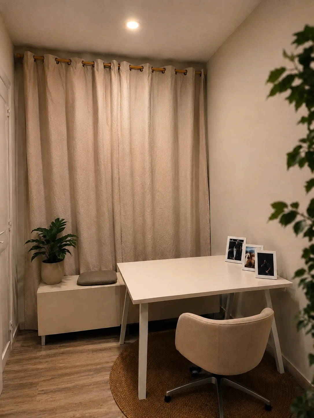 Focus Zone with desk, chair, curtain and plant for calls and focused work